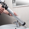 Pistola para calafatear, 750 ml, "cerrada", cuerpo de aluminio, vastago redondo 8 mm Sparta